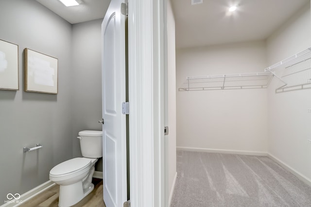 bathroom featuring toilet