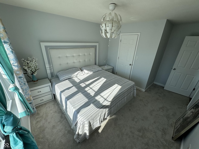 bedroom with a closet and light carpet