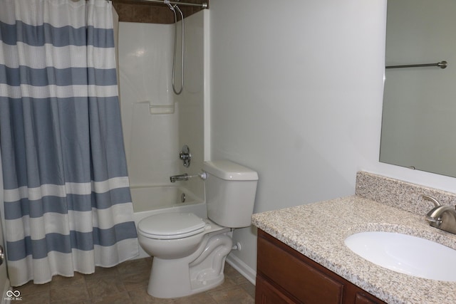 full bathroom with shower / tub combo with curtain, vanity, and toilet