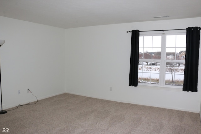 empty room with carpet floors