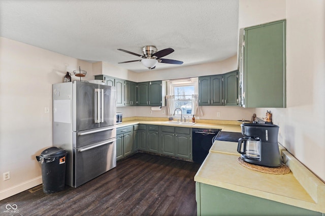 kitchen with sink, a textured ceiling, high quality fridge, dark hardwood / wood-style floors, and ceiling fan