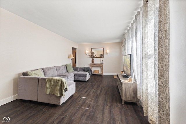 living room featuring dark hardwood / wood-style flooring