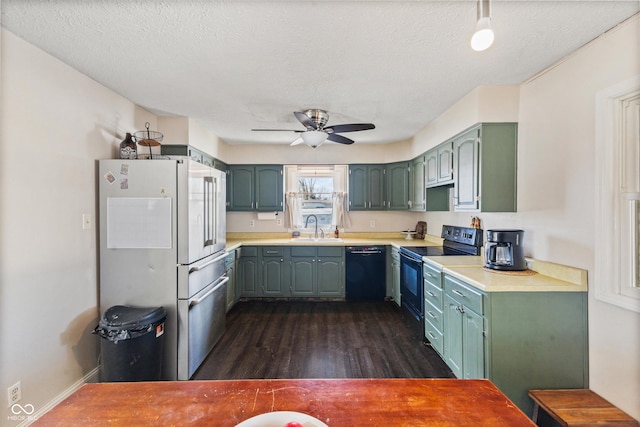 kitchen with sink, a textured ceiling, dark hardwood / wood-style flooring, ceiling fan, and black appliances