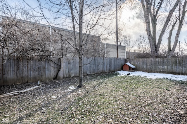 view of yard covered in snow