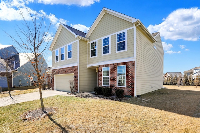 traditional home featuring a front yard, concrete driveway, brick siding, and an attached garage