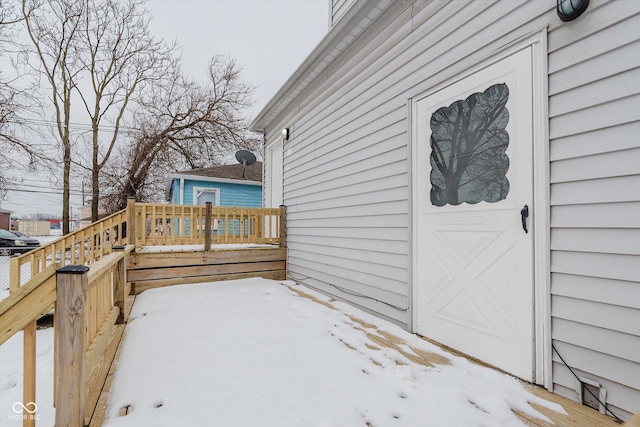 view of snow covered deck