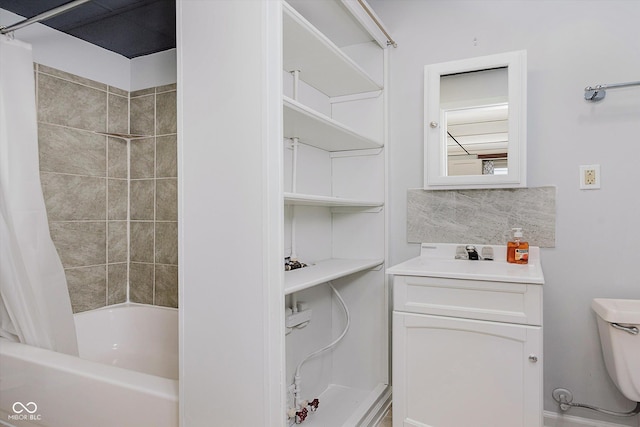 full bathroom with vanity, shower / bathtub combination with curtain, and toilet