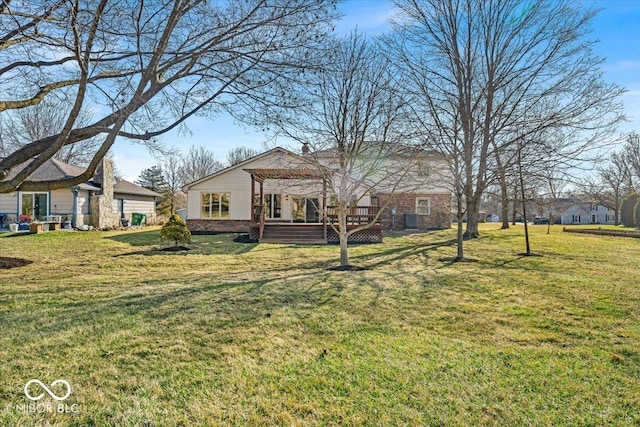 view of yard featuring a wooden deck