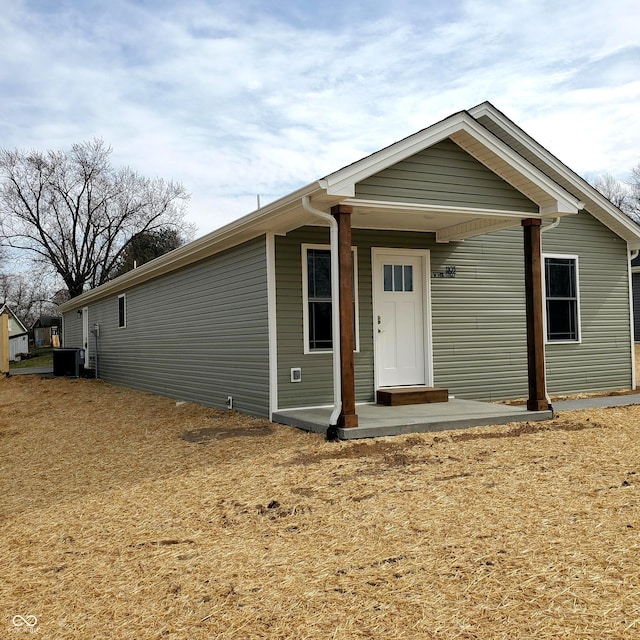 view of front of property featuring cooling unit