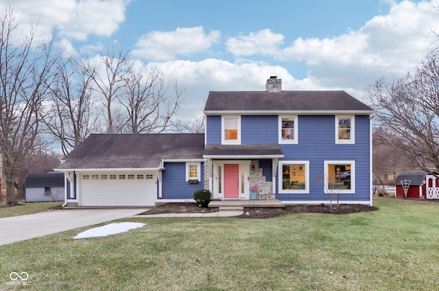 view of front of house with a garage and a front yard