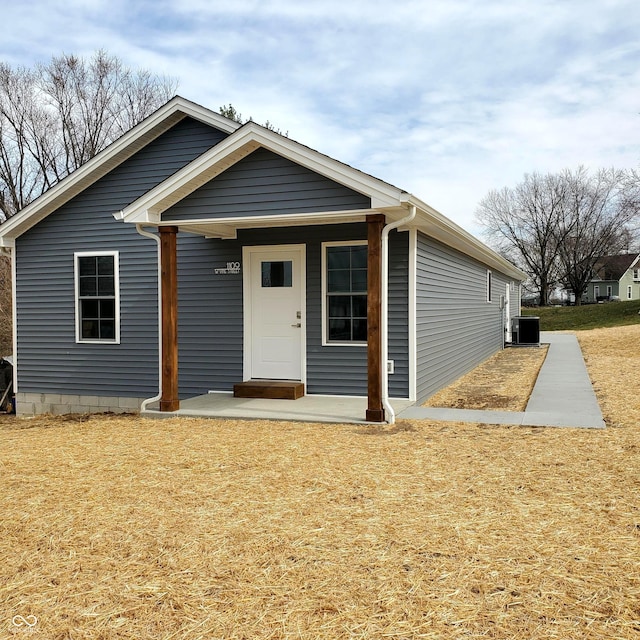 view of front of house with cooling unit