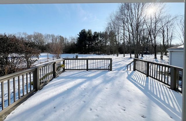 view of snow covered deck