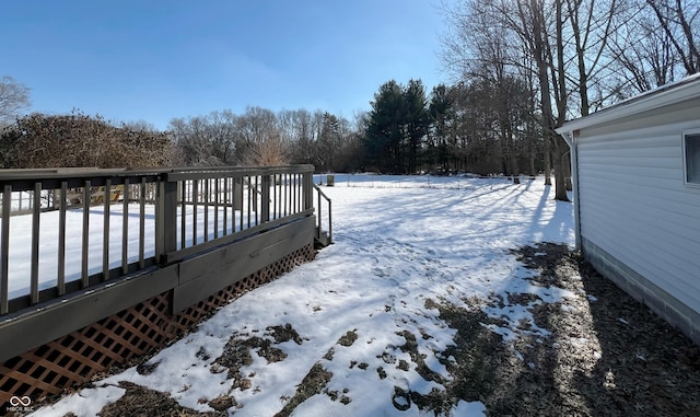 view of snow covered deck