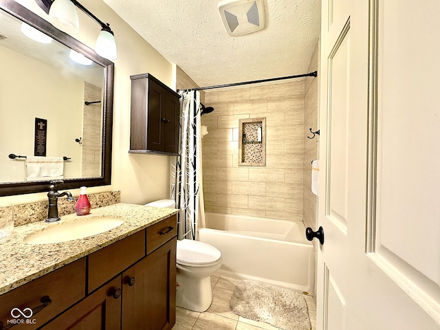 bathroom with a textured ceiling, toilet, vanity, and shower / bathtub combination with curtain