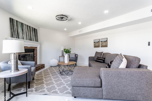 living room featuring a fireplace