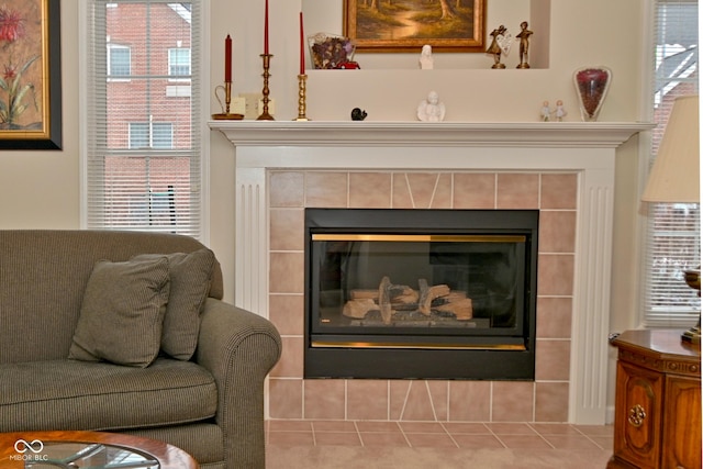 interior details with a tiled fireplace