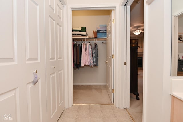 hallway with light carpet