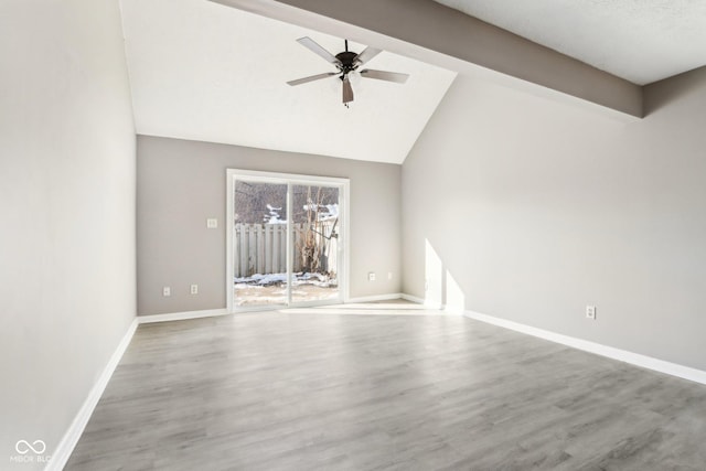 unfurnished living room featuring ceiling fan, high vaulted ceiling, and hardwood / wood-style floors