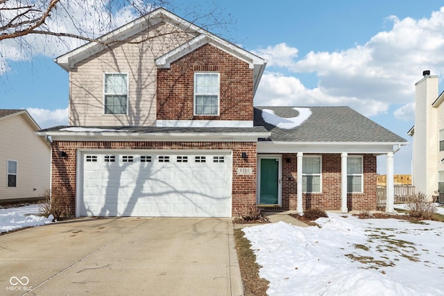 front facade with a garage