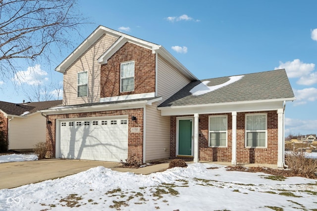 front of property with a garage