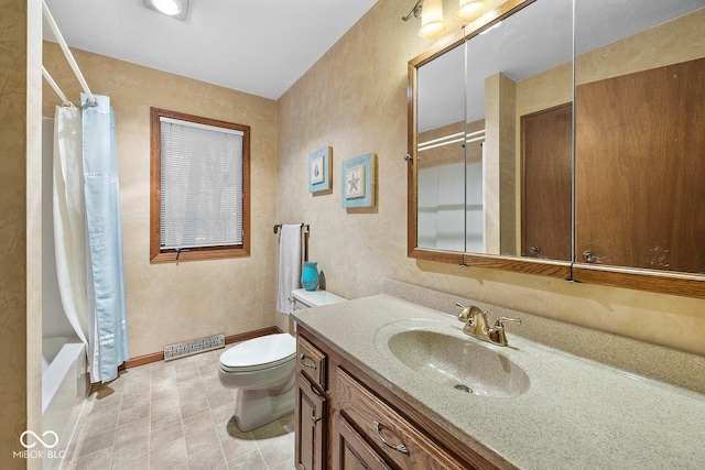 full bathroom featuring vanity, toilet, and shower / bath combo with shower curtain