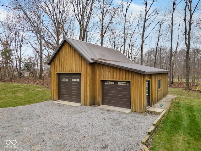 garage with a lawn