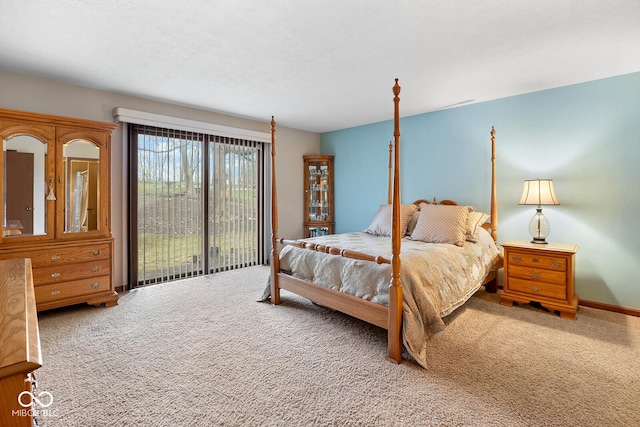 carpeted bedroom with access to outside