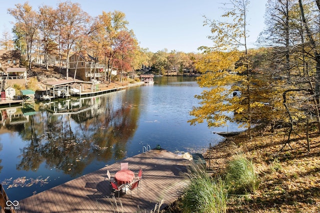 view of dock with a water view