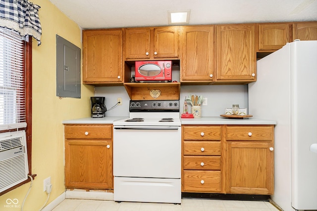 kitchen featuring brown cabinetry, light countertops, white appliances, and electric panel