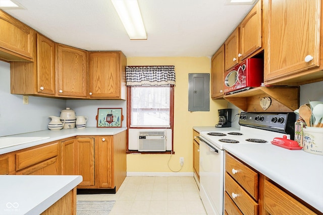 kitchen with a sink, white electric range, light countertops, and electric panel