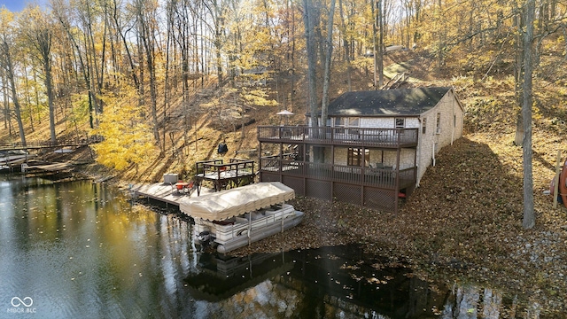 dock area with a deck with water view