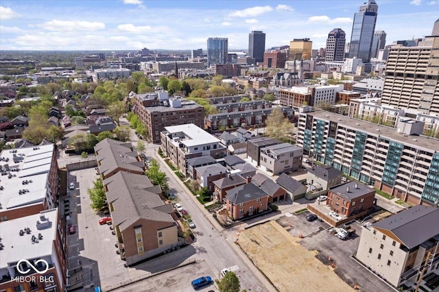 birds eye view of property with a view of city