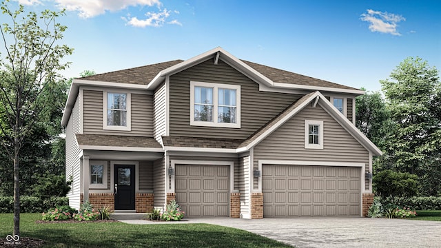 view of front of home featuring a garage and a front yard