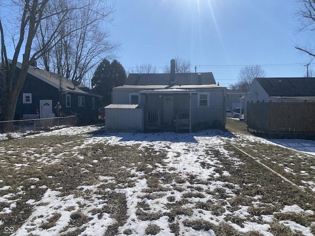 view of snow covered property