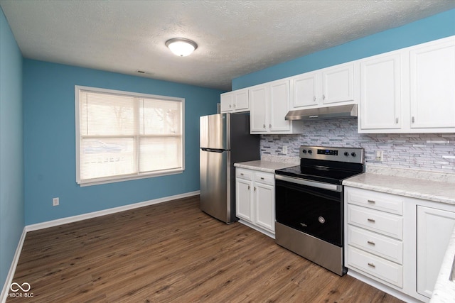 kitchen with a textured ceiling, white cabinets, appliances with stainless steel finishes, dark hardwood / wood-style flooring, and backsplash