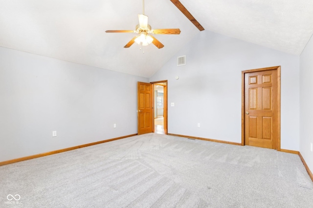 unfurnished room featuring high vaulted ceiling, beamed ceiling, light colored carpet, and baseboards