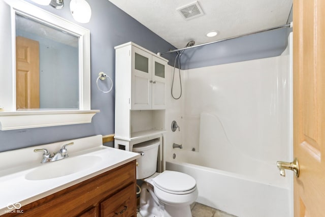 bathroom featuring toilet, visible vents, shower / bathing tub combination, and vanity