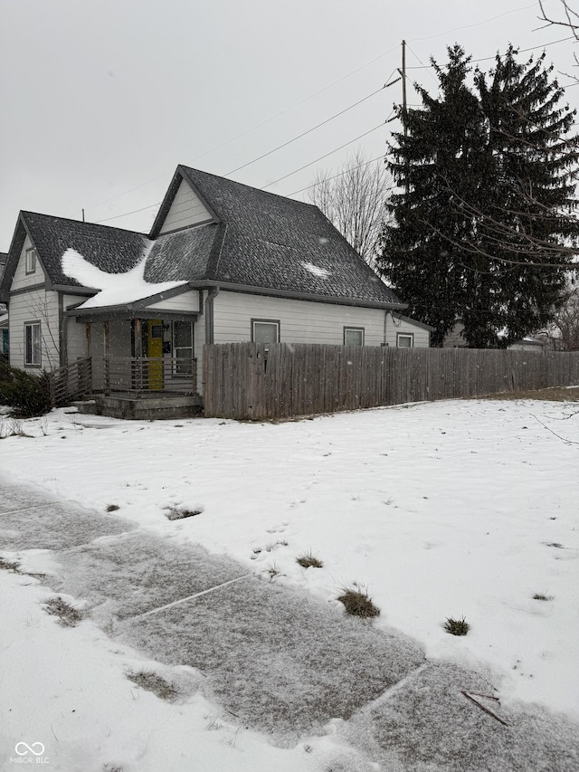 view of snow covered property