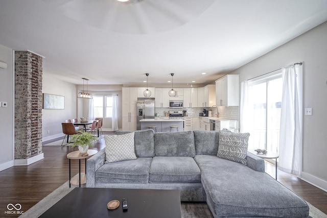 living room featuring dark hardwood / wood-style flooring