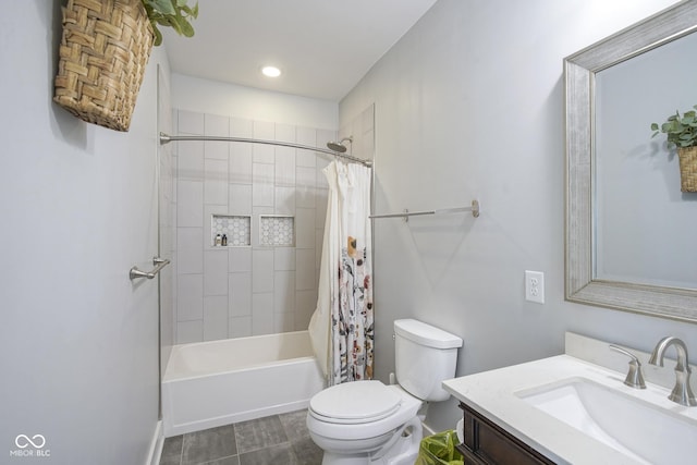 full bathroom with vanity, toilet, and shower / bath combo with shower curtain