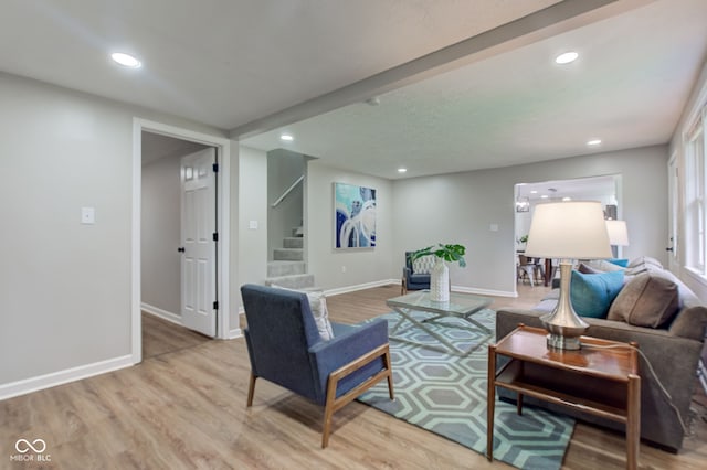 living room with light hardwood / wood-style floors