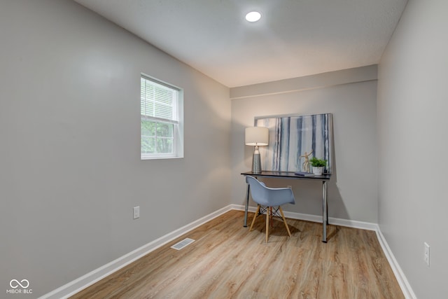 office space featuring light wood-type flooring