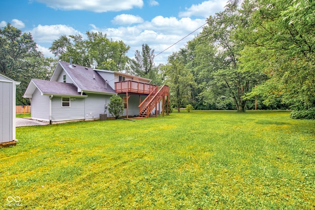 view of yard with a deck