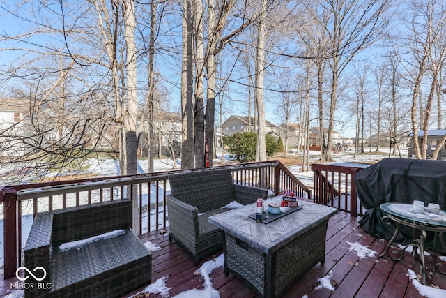 view of snow covered deck