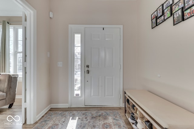 entrance foyer with light hardwood / wood-style flooring