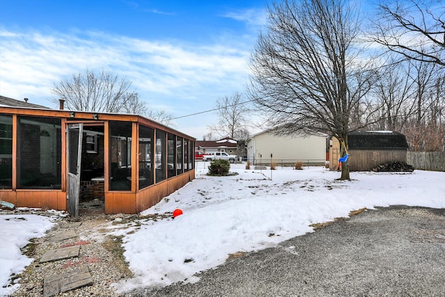 view of yard layered in snow