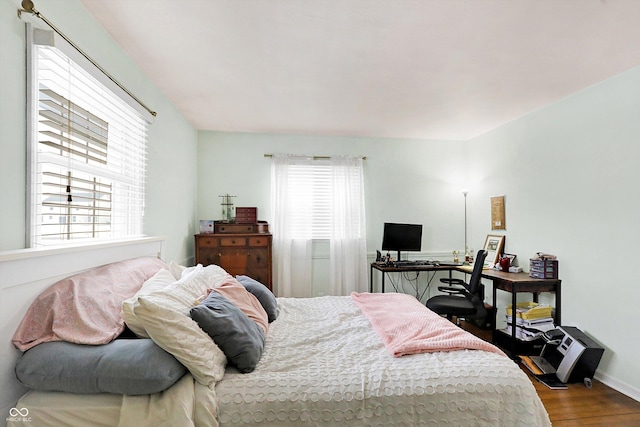 bedroom featuring hardwood / wood-style floors