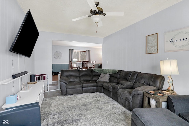 living room featuring ceiling fan