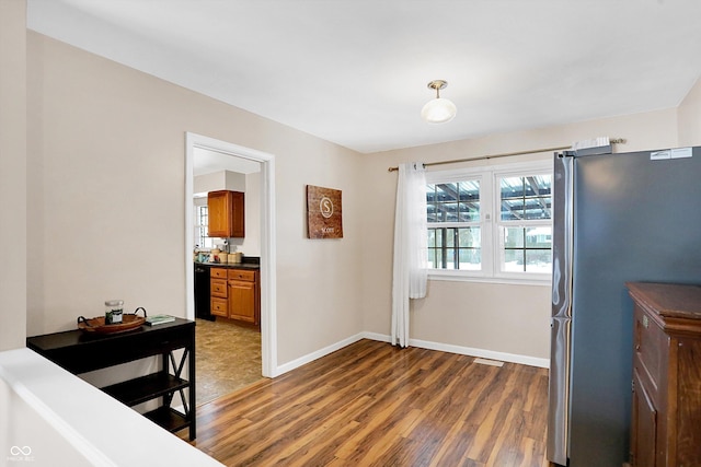 interior space with dark wood-type flooring