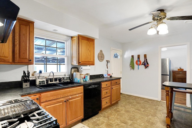 kitchen with ceiling fan, range hood, sink, and black appliances